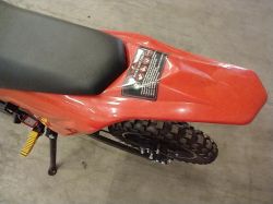 Kids Cross Takalokasuoja punainen